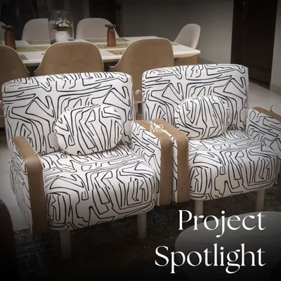 Project Spotlight: The Zaildar Residence. This living room embraces an abstract theme, featuring our custom armchair upholstered in a bold black-and-white fabric that adds a playful yet elegant touch to the space.