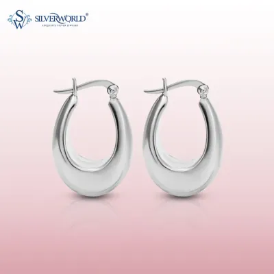 These classic U-shaped silver hoops are a modern wardrobe essential. Their high-polish finish and solid feel make them a versatile choice for any occasion.