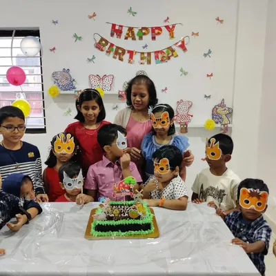 Happy Birthday! We love hosting celebrations, like this animal-themed art party. The kids got to make their own masks and then gathered around the cake for a big birthday cheer. It's a party they won't forget!