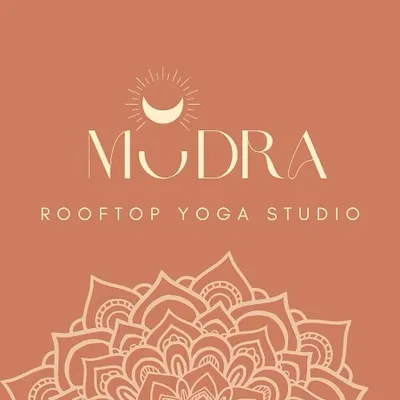 The official logo for Mudra Rooftop Yoga Studio. The design reflects my commitment to holistic wellness, mindfulness, and creating a serene space for our community.