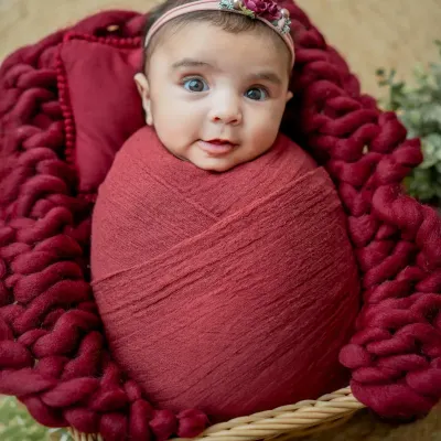 Sometimes the most beautiful moments are when they are awake. I love capturing their bright, curious eyes and adorable expressions.