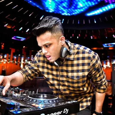 A throwback shot of me locked in, focused on the mix. The gear changes, the hairstyle changes, but the passion for music is forever. Happy World DJ Day.
