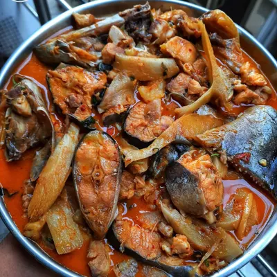 A delicious curry made with Pangasius fish and bamboo shoots. The bamboo shoots add a unique, tangy flavor to the rich fish curry.