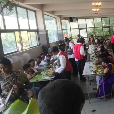 We provide complete catering solutions, including traditional South Indian leaf service. Here, our uniformed staff are serving guests at a Half Saree function.