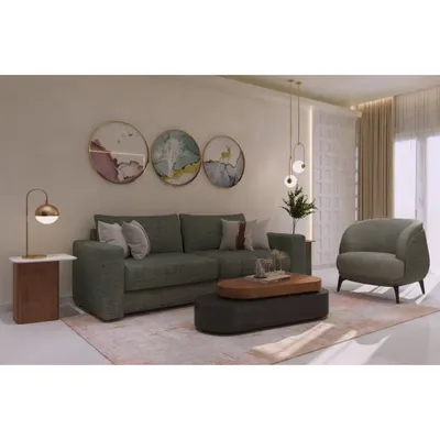 This living area showcases a blend of art and comfort. We paired a solid-colored sofa with a sculptural accent chair and a two-tiered coffee table, creating a balanced and welcoming space for relaxation.