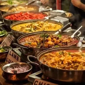 Our signature buffet setup, showcasing the rich variety and generous portions we offer. From fragrant curries to flavorful starters, we ensure there is something for every palate at your event.