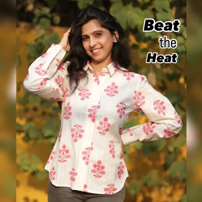 Beat the heat in style with our summer shirts. This one, with its delicate pink print on a striped base, is made from breathable fabric to keep you cool and comfortable.