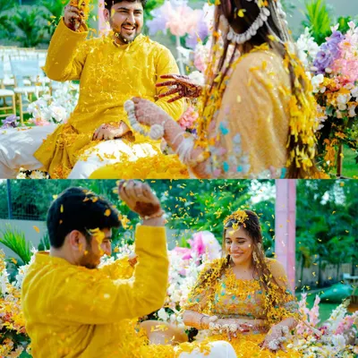 A playful moment from a Haldi ceremony, with the couple showering each other in flower petals. We capture the fun and vibrant colors of this happy ritual.