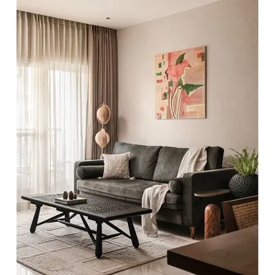 Introducing 'Kayu', a quaint home designed to embrace minimalism with warm teak wood tones and subtle, muted colors. This living room is a perfect example of the balance between simplicity and elegance, creating a serene and inviting atmosphere.