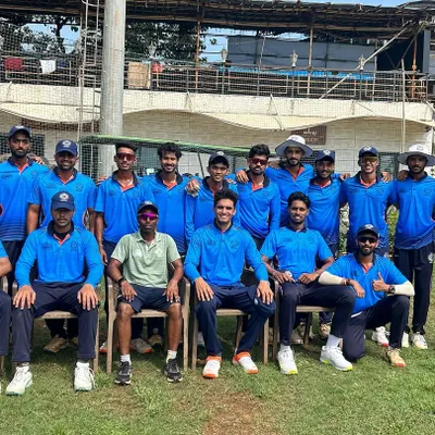 Our team, proudly wearing the club's blue jerseys, poses for a group photo on the field. This picture reflects the unity and readiness of our players for the Kanga Cricket League.