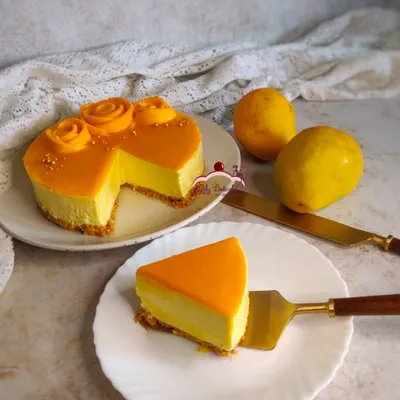 You can almost taste the sunshine in my seasonal mango cheesecake. I use a creamy, rich filling and top it with a vibrant mango glaze and fresh mango rosettes for the perfect summer dessert.