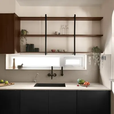 This kitchen renovation features a clean, modern design with black lower cabinets and open wooden shelves. A wide window above the sink floods the space with natural light, making it feel bright and airy.