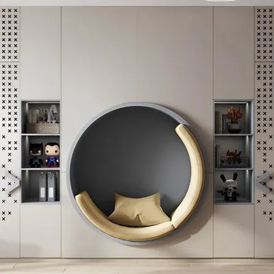 We love creating unique features like this built-in circular reading nook. Integrated directly into the wardrobe system, it provides a cozy, private spot for a child to curl up with a book and their favorite toys.