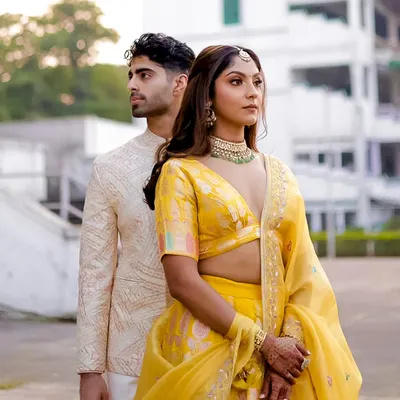 For Siddhant's Roka ceremony, I crafted this elegant embroidered bandhgala in a soft cream hue. It's a timeless piece that marks a special moment with understated grace.