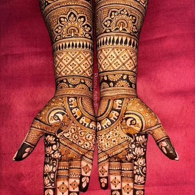 This stunning ring ceremony design is filled with beloved traditional symbols. I combined floral patterns with peacock and elephant motifs to create a rich, celebratory look perfect for an engagement.