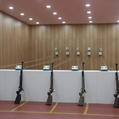 This is our 10-meter air rifle range, fully equipped and ready for action. The clean, organized, and professional setup is designed to give you a true taste of a competitive shooting environment.