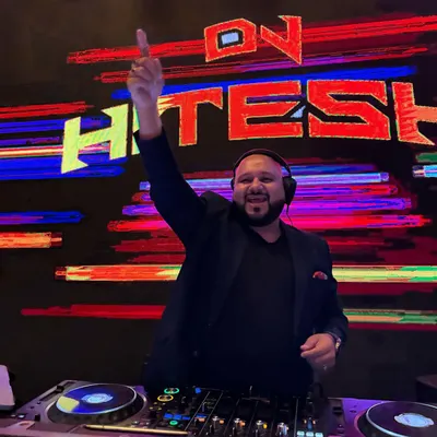 The only way to do great work is to love what you do. This shot captures that feeling perfectly, with my name in lights and the music at my fingertips.