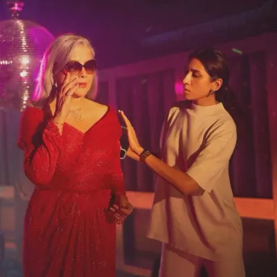 On set with the legendary Zeenat Aman, making final adjustments to the custom red disco gown for the Mia by Tanishq campaign. It was an honor to work so closely with an icon to bring this vibrant, retro-inspired vision to life.