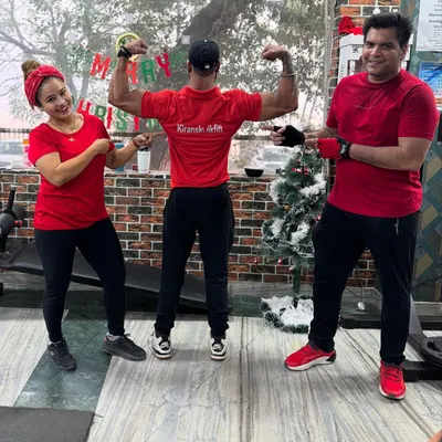 Having some fun and flexing after a great workout. We work hard, but we also make sure to enjoy the journey. This is what our fitness family is all about.