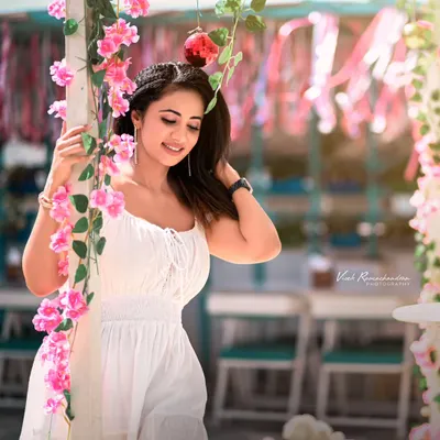 A beautiful shot from a professional photoshoot. I created a fresh, summery look with soft makeup and natural hair to match the client's white dress.