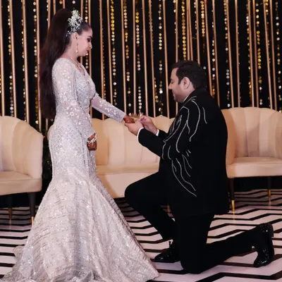 A classic proposal moment, where he gets down on one knee to ask the most important question. I capture this from an angle that highlights the emotion and significance of the gesture.