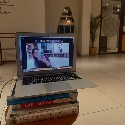 This is how we connect with our online community. A laptop set up in the studio, bringing our live classes to students all over the world.
