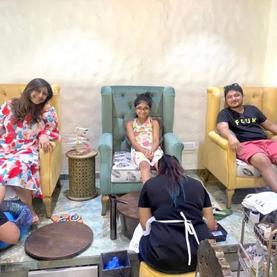 A family enjoying a relaxing day with us. Here they are getting our indulgent Milk & Honey pedicure, a 6-step treatment designed to exfoliate, hydrate, and leave skin glowing.