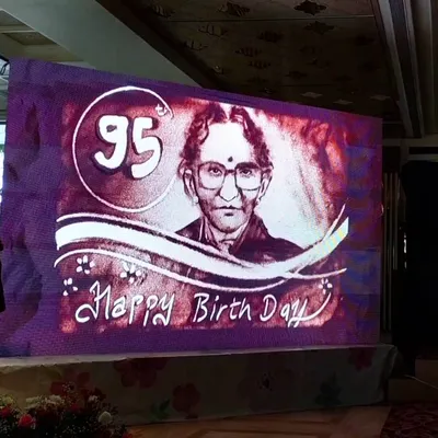 The grand finale portrait for a 95th birthday celebration in Amravati. Capturing a lifetime of wisdom and love in sand is a profound experience.