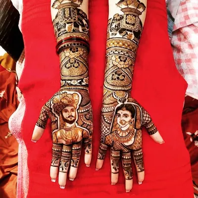 A royal portrait bridal mehndi featuring stunningly detailed figures of a king and queen, perfect for a bride who wants a majestic and traditional design.