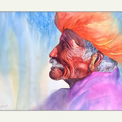 Titled 'A Life Well Lived,' this large watercolour piece celebrates the beauty of old age. The vibrant colours of the turban and shirt contrast with the detailed wrinkles on his face, each one a mark of time and experience.