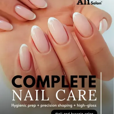The French manicure is a true classic, and we perfect it. Our process focuses on creating a clean, natural nail bed with a crisp, white tip, all sealed with a high-shine top coat for a polished and professional look.