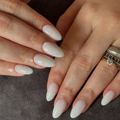 Pure, chic, and effortlessly classy. A beautiful set of milky white gel extensions in a flattering almond shape.