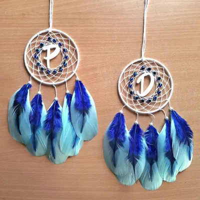 Protect your journey with our personalized evil eye dreamcatcher car hangings. This pair, customized with the initials 'P' and 'D', combines spiritual protection with a personal touch.