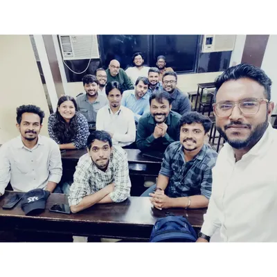 A selfie capturing our team of dedicated teachers during a faculty meeting. We regularly collaborate to refine our teaching strategies and ensure the best learning outcomes for our commerce and science students.