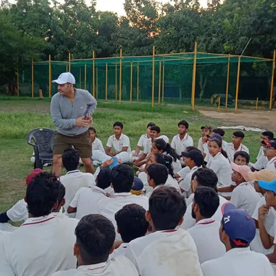Our mentor, Virender Sehwag, addresses a group of young cricketers at our R K Puram centre. These group sessions are crucial for sharing game strategy and building mental toughness.
