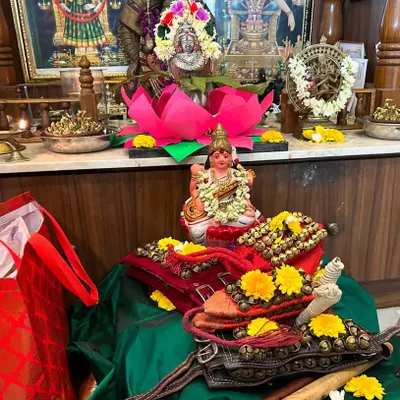 Our altar for the Dussehra Puja. We offer our salangai (ankle bells) and instruments to the goddess Saraswati, seeking her blessings for our learning journey. This ritual of Vidyaarambham marks the beginning of a new year of dance education.
