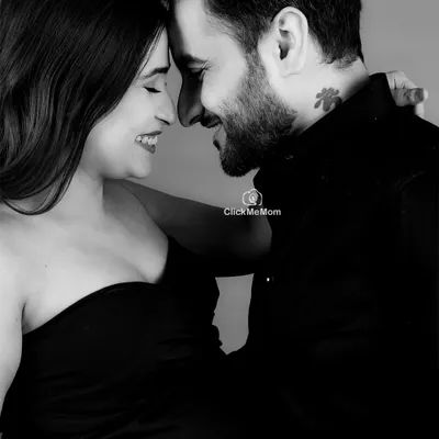 Pure connection, captured in timeless black and white. This intimate close-up focuses on the joyful and loving expressions between the couple, creating a powerful and emotional memory.
