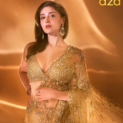 A closer view of the Aza Fashions cover look for Dhvani Bhanushali. The intricate detailing on the Seema Gujral blouse and the soft, shimmering fabric of the saree were key elements in building this high-glam, editorial desi look.