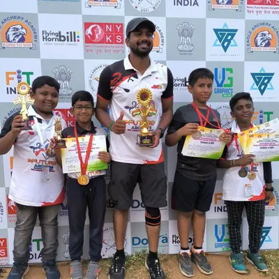 Celebrating a great victory with our young champions. I am incredibly proud to stand with these students as they display their trophies and medals from a recent youth archery competition.