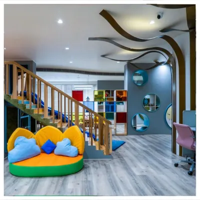 The interior of The Cuddle House playschool, featuring a custom tree-like ceiling element and colorful, soft seating. My role as general contractor was to bring this imaginative design to life with a focus on child safety and durability.