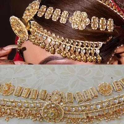 A detailed view of a Kundan mathapatti, showing the intricate floral design. This piece can be worn for weddings or other grand occasions.