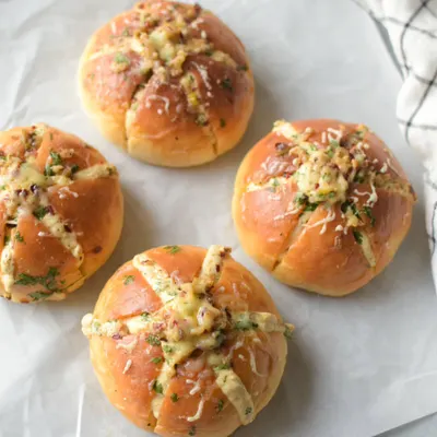 My bestselling Korean Cream Cheese Garlic Buns are back! These savory, cheesy, and garlicky treats are made with homemade eggless brioche and are incredibly addictive. Available in a box of 4.