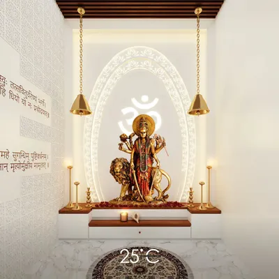 We designed this pooja room to be a serene and divine space. It features a backlit arch with intricate jaali work, the sacred 'Om' symbol, and hanging brass bells, all set against a clean white backdrop to create a peaceful sanctuary.