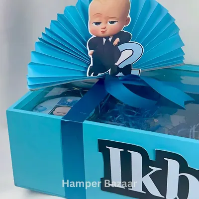 A close-up of our popular Boss Baby hamper, personalized for Ikbir's 2nd birthday. The sturdy pinewood box can be reused later.