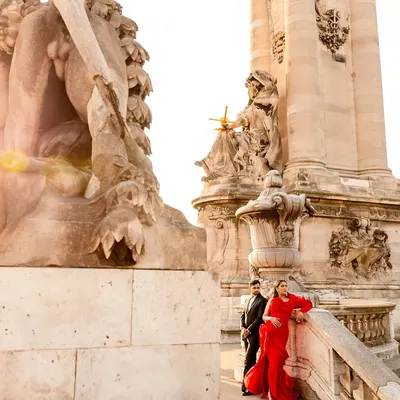 A quintessential pre-wedding portrait in Paris, with the city's stunning architecture as the backdrop for Sachi and Nemil's love story.