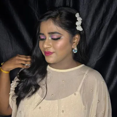 A trendy lavender eye makeup look demonstrated for our students. We teach how to create modern, fashion-forward looks that are popular with clients today.