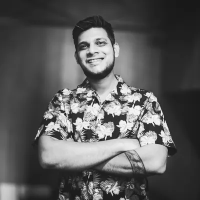 A professional black and white portrait. This is me, ready to plan the music for your next event.