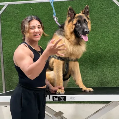 Here I am with my son, my German Shepherd. His trust and companionship are a constant reminder of the special bond we share with our dogs and why I put so much love and care into my work.