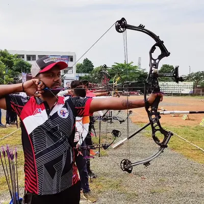 The intensity of competition is where our training pays off. This is one of our senior archers demonstrating perfect compound bow technique during a state-level event.