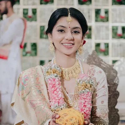 This is the true definition of my signature look. I created an incredibly luminous base, soft eye definition, and a natural lip color for a timeless and radiant South Indian bridal look.